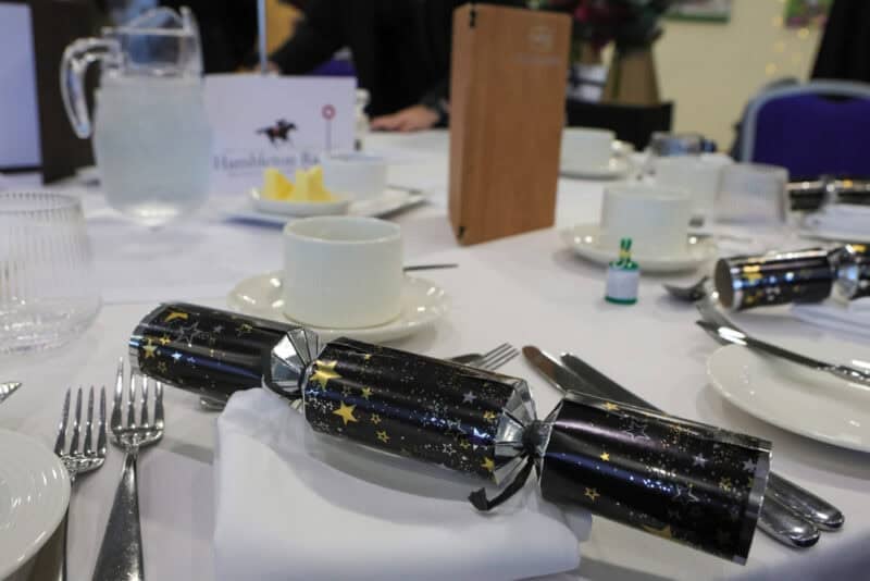 Table setting at a Hambleton Racing Christmas social event.