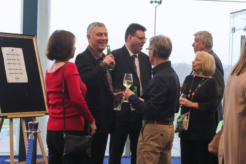 Owners catching up at a Hambleton Racing Christmas social event.