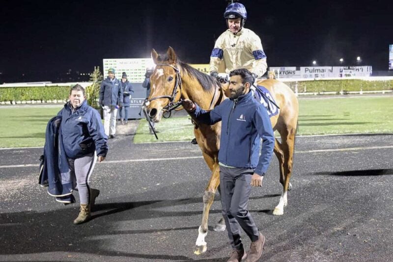 Lord Capulet and Tom Eaves return to the winner's enclosure after winning at Newcastle.
