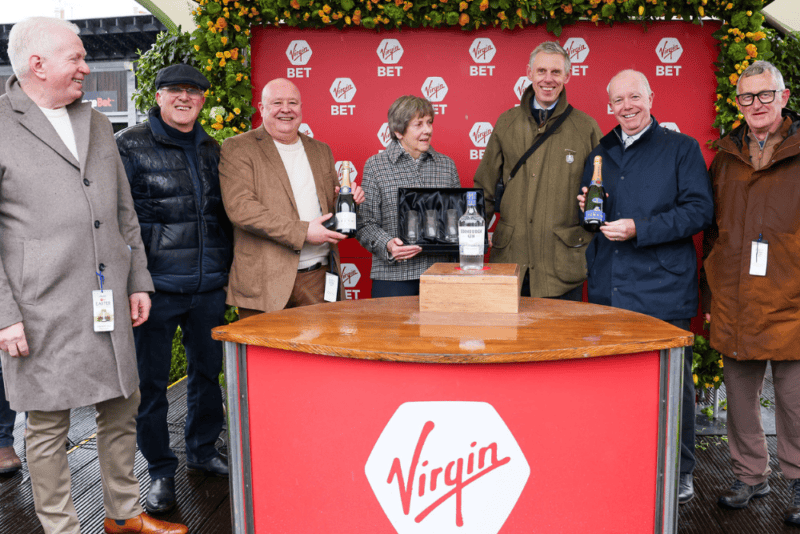A group of people receive a prize for Hambleton Racing at Musselburgh racecourse.