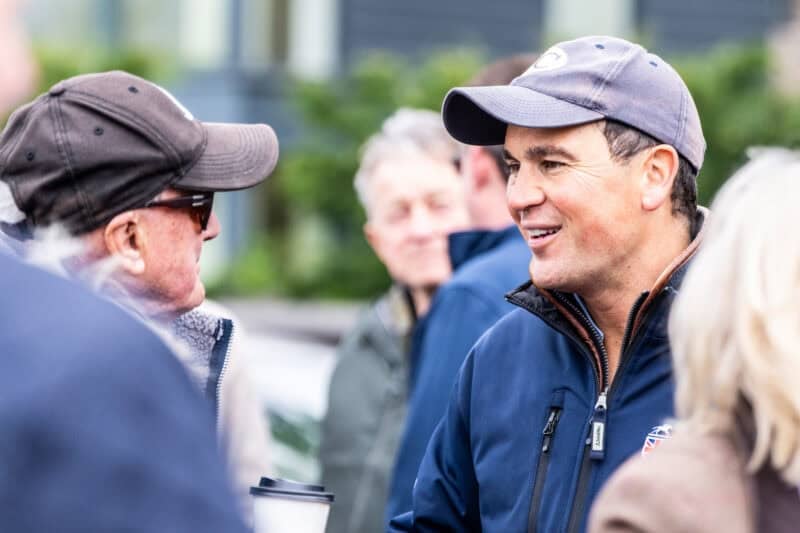 Tom Clover chatting to a Hambleton Racing owner.