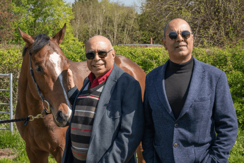 Owners have their photo taken with horse Able Tasman.